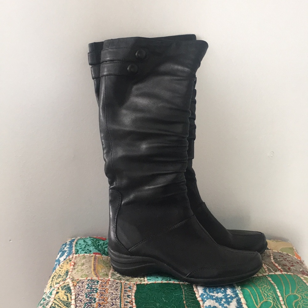 Tall black leather boots
